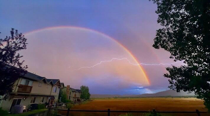 Double rainbow with lightning bolt