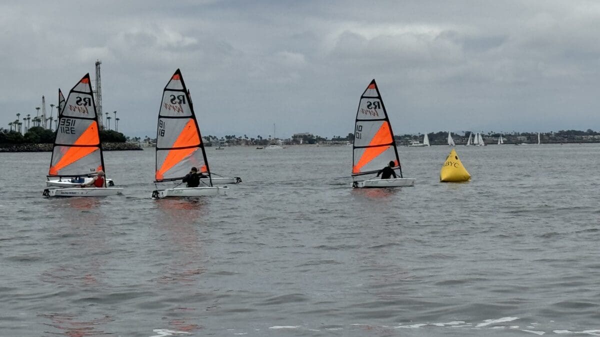 Park City Sailing's Court Malouf, who just competed in Denmark at World's, pictured here earlier in the season crossing the finish line on the right capturing third place at Nationals in California.