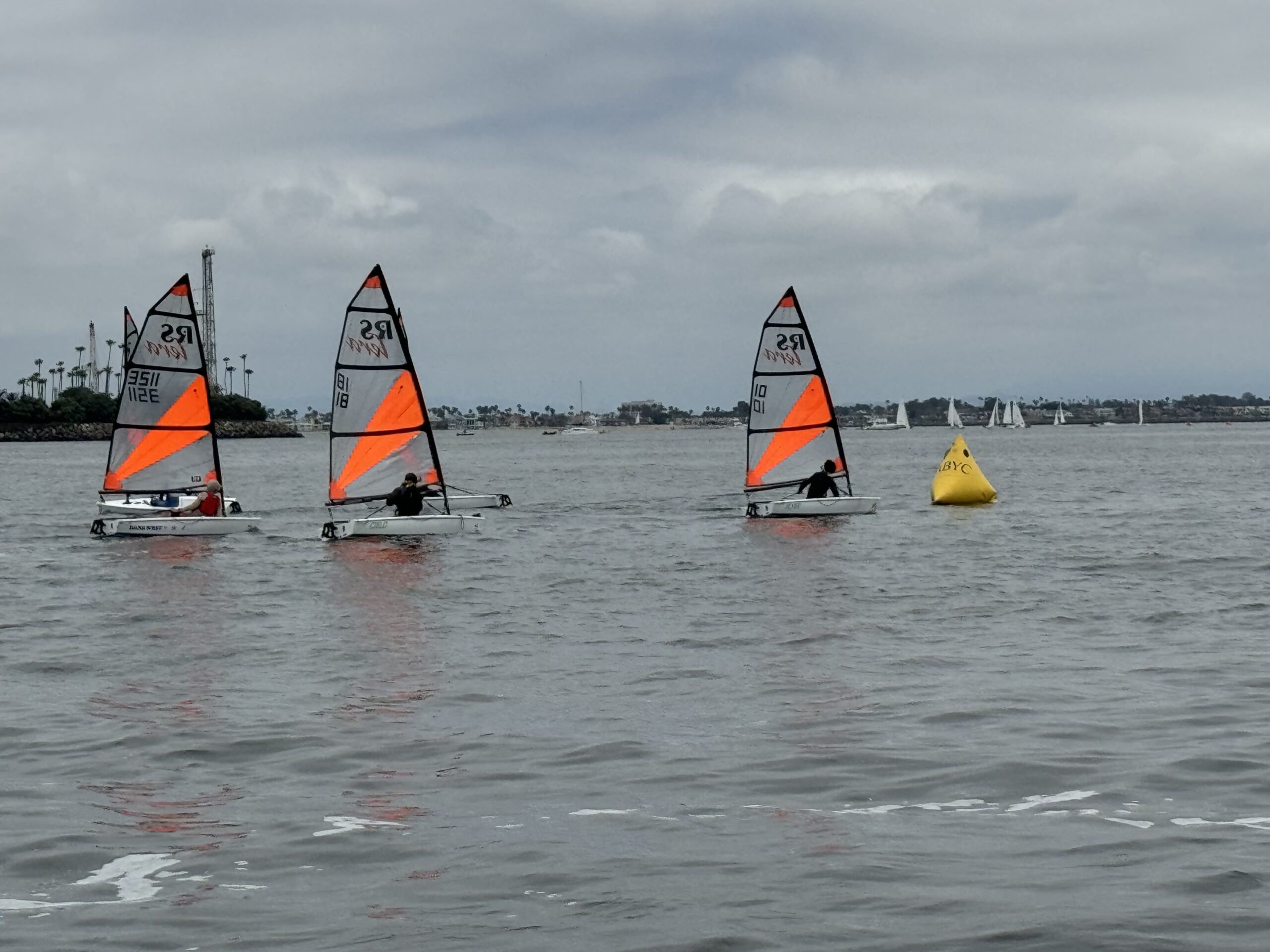 Park City Sailing's Court Malouf, who just competed in Denmark at World's, pictured here earlier in the season crossing the finish line on the right capturing third place at Nationals in California.