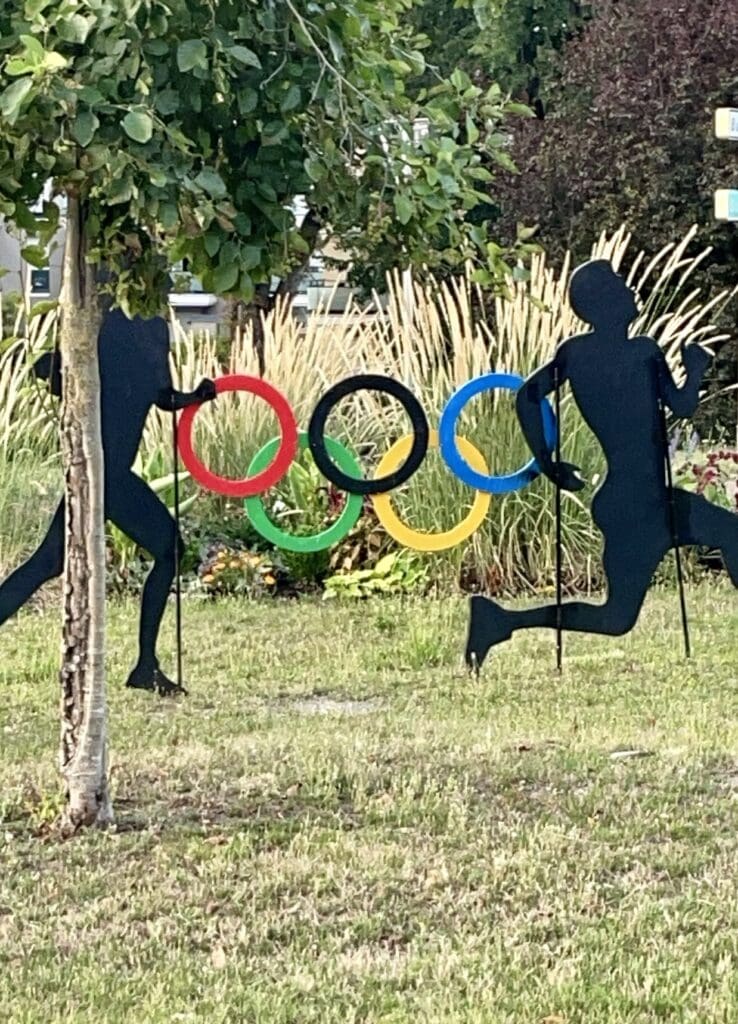 Running Olympic Rings signs in Paris. 