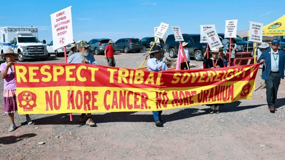 Navajo Nation President Buu Nygren marched with protestors on Aug. 2, 2024, in Cameron, Arizona, to oppose the transportation of uranium across Navajo land.