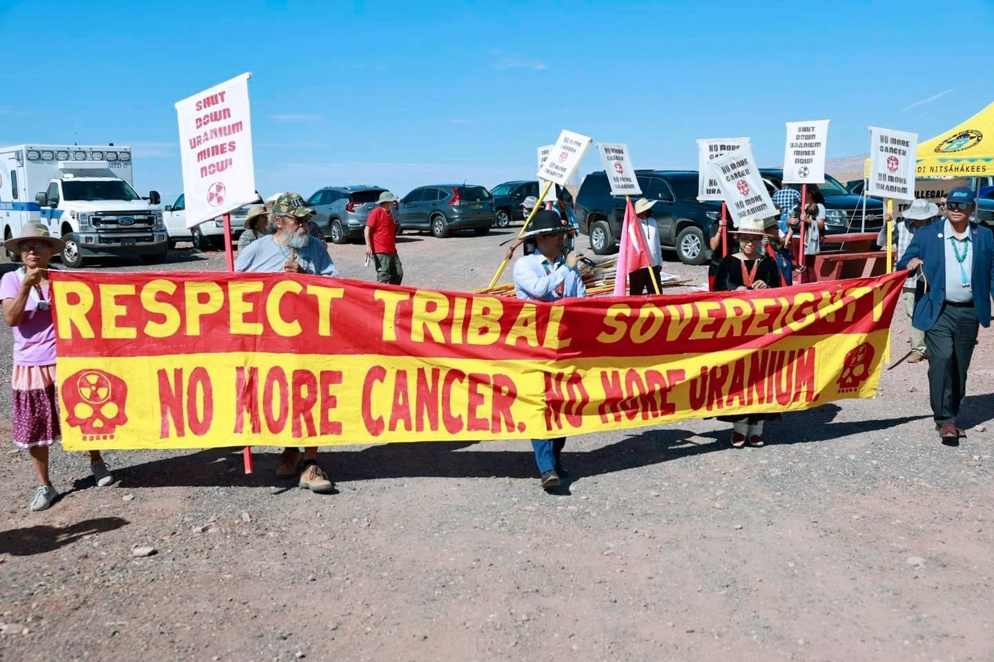 Navajo Nation President Buu Nygren marched with protestors on Aug. 2, 2024, in Cameron, Arizona, to oppose the transportation of uranium across Navajo land.