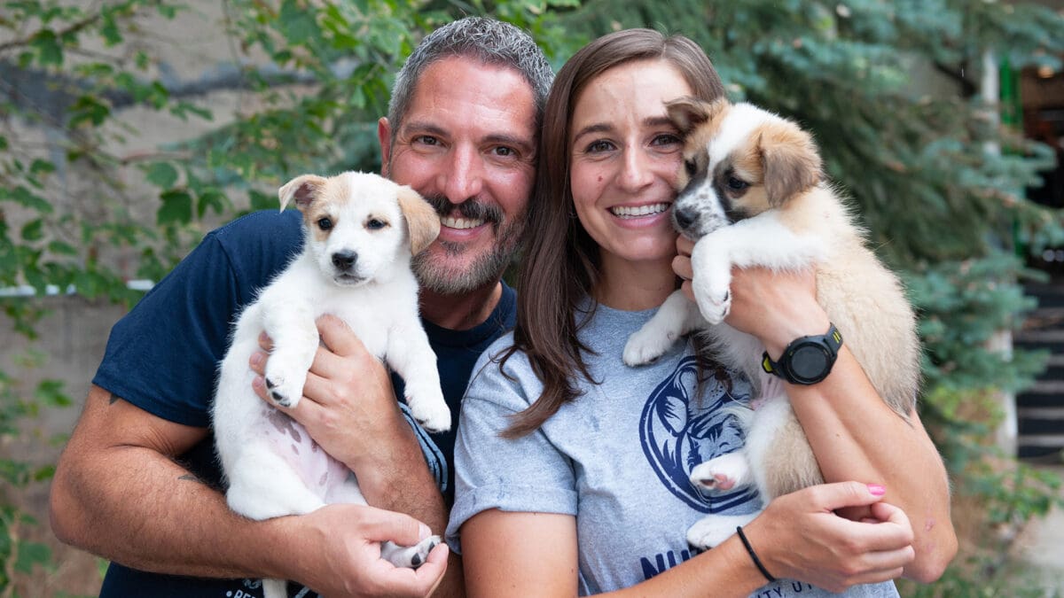 Josh Stasinos, development manager for Nuzzles & Co, and Emily Jens, volunteer at Nuzzles at the Nuzzles & Co and Stio adoption collaboration on Aug. 10, 2024.