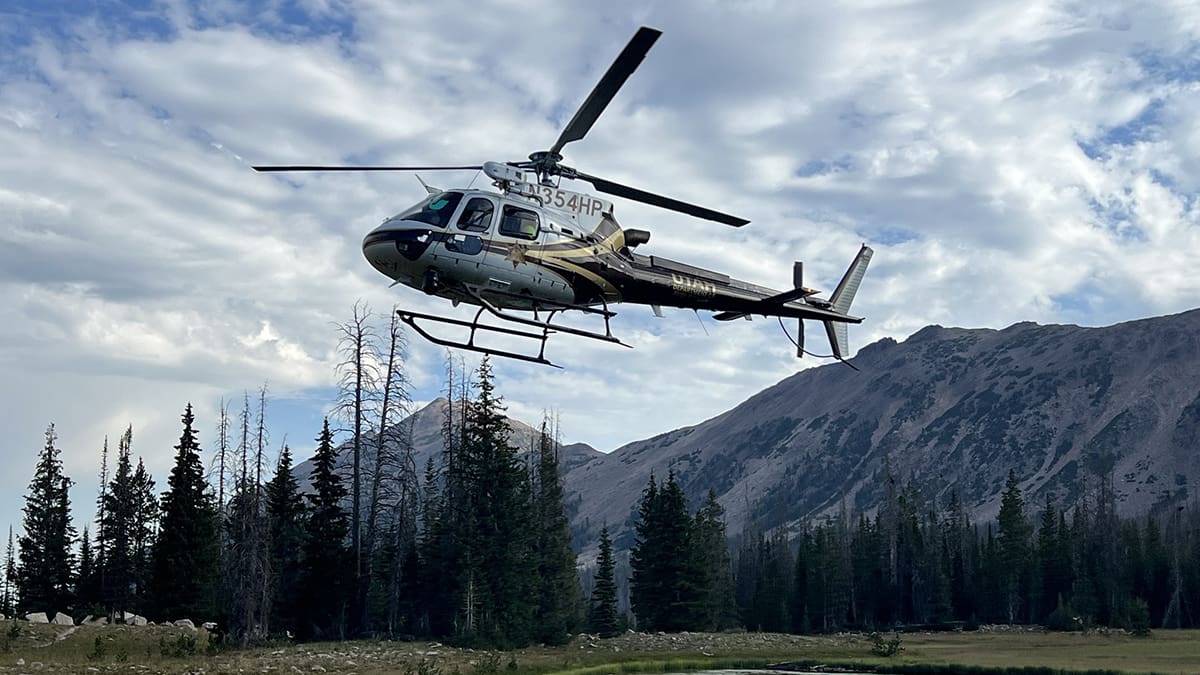 A DPS helicopter takes off in the high Uintas this weekend as search and rescue personnel were deployed to find a missing teenage boy. The boy was rescued in good condition on Sunday morning.