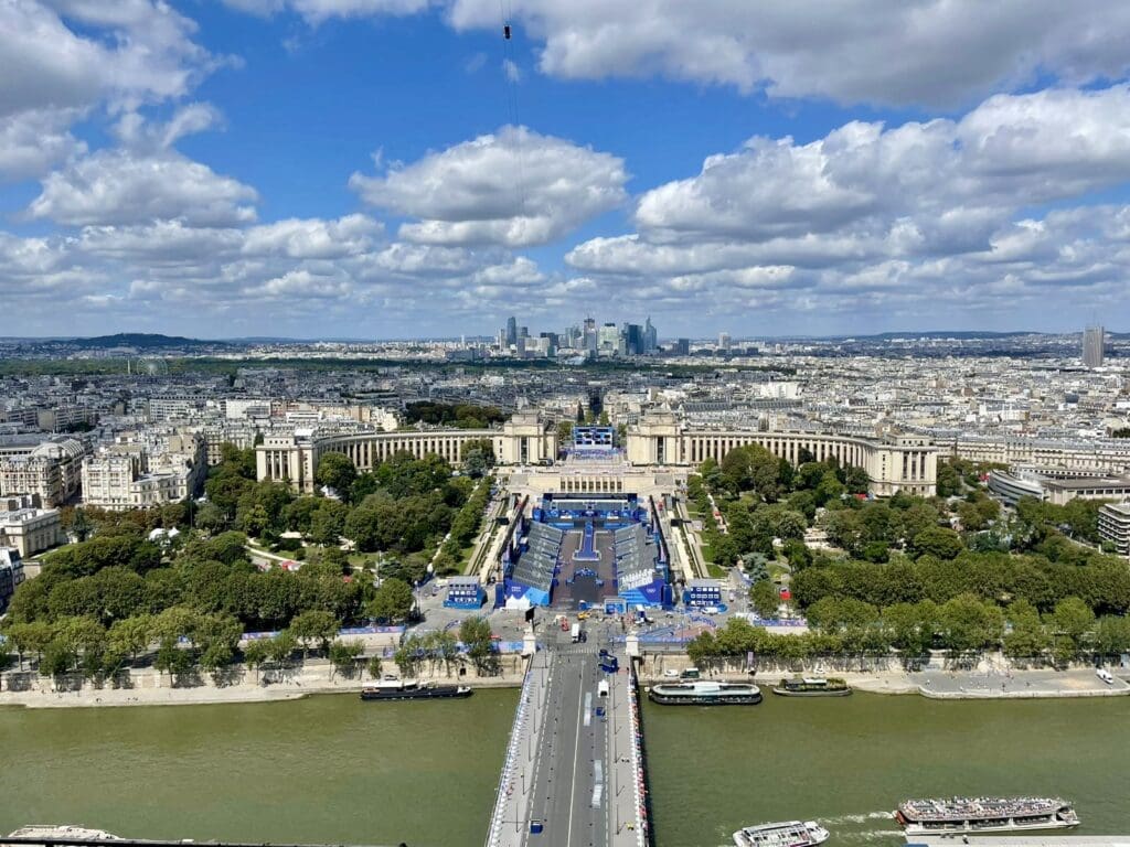 As seen from the top of the Eiffel Tower, this photo highlights the Seine River and the Champions Park Venue of the Paris 2024 Olympics where Raboutou gets to parade her medal, along with all the daily medalists from all nations and all sports i front of an adoring crowd. . 