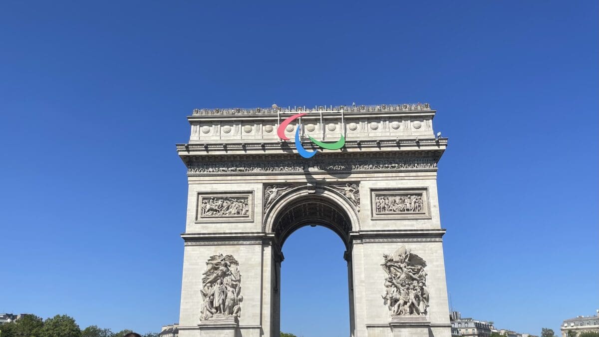 Paris' Arc De Triomphe adorned with the Paralympics symbol.