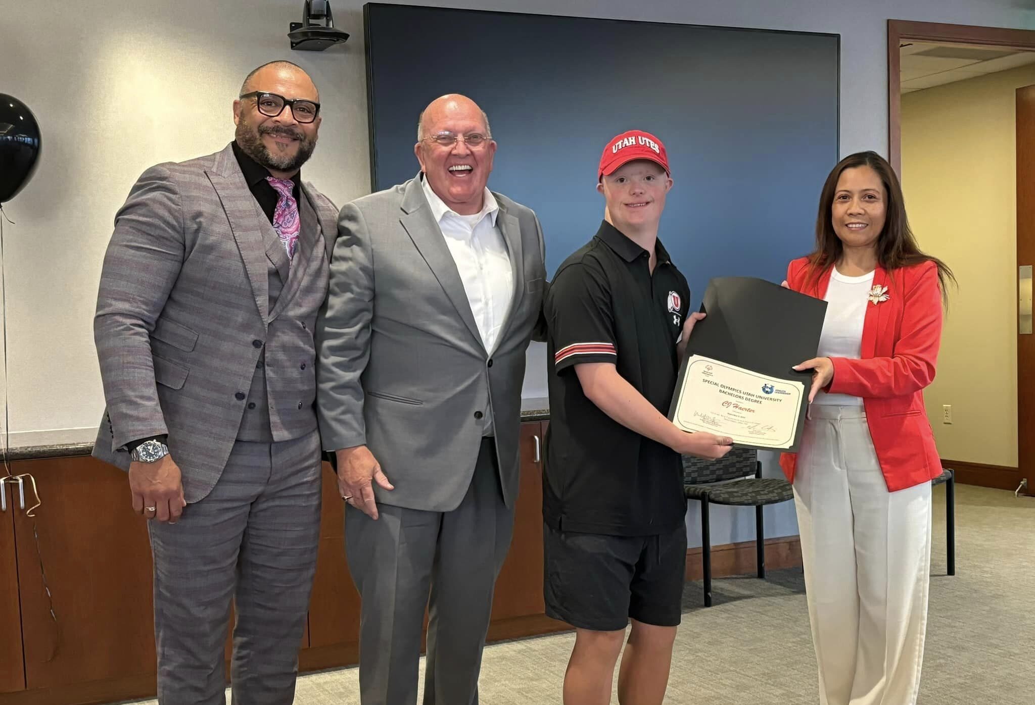 Bill Schuffenhauer (left) Olympian, celebrating the successes of Special Olympians like Park City's C.J. Haerter (3rd from left).