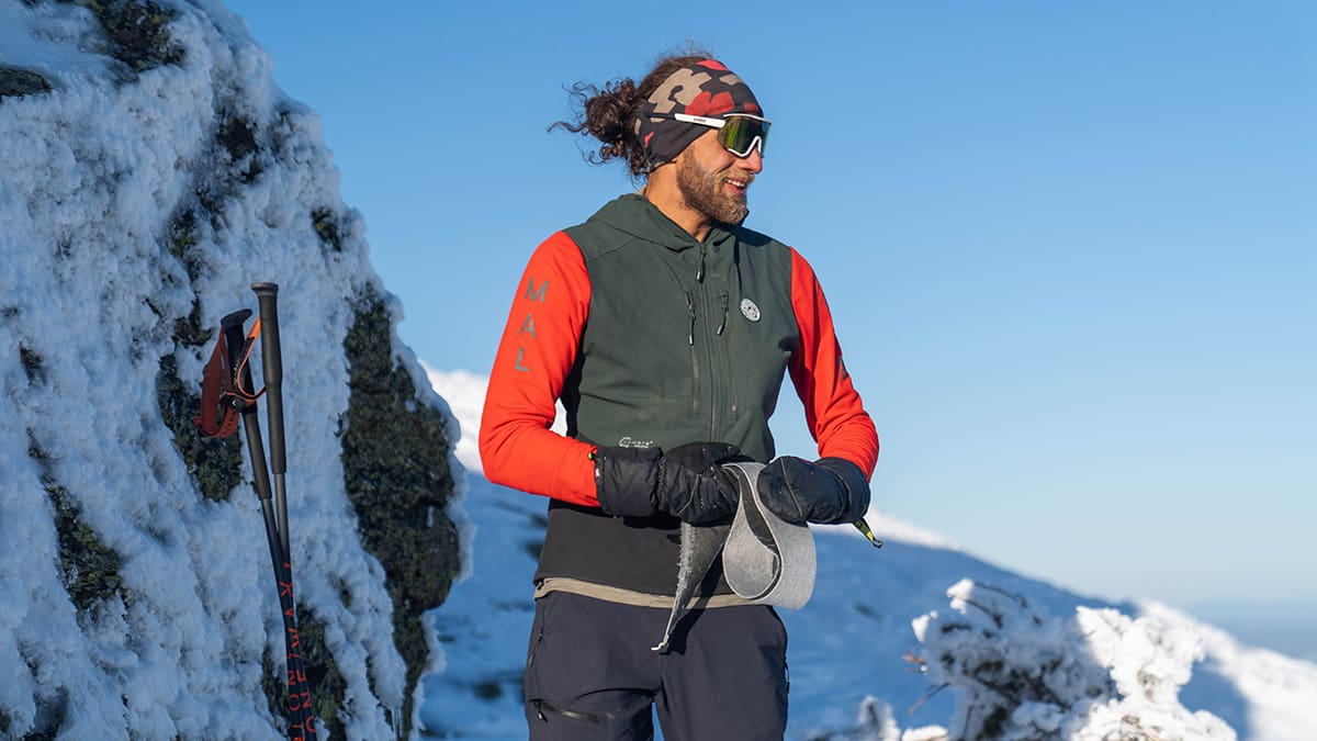 Noah Dines stands atop Mount Mansfield, his home mountain. Dines broke the world record for human powered vertical feet skied in a year on September 2, 2024.