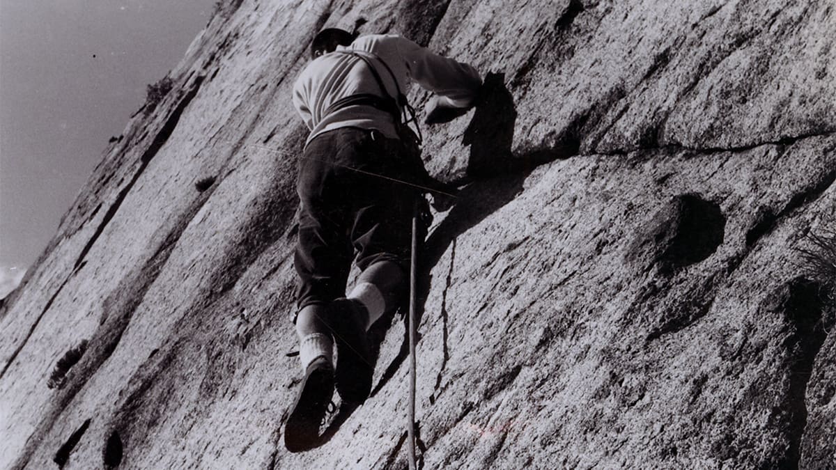 Larry Love leading the first pitch of the Sail Face in Little Cottonwood Canyon.