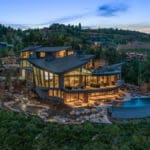 Mountainhead rises above Deer Crest on Aug. 5, 2025. The seven-story estate—now available through Luxe Haus for $57,917 a night—features a private ski-in gondola, infinity pool and NBA-regulation court.