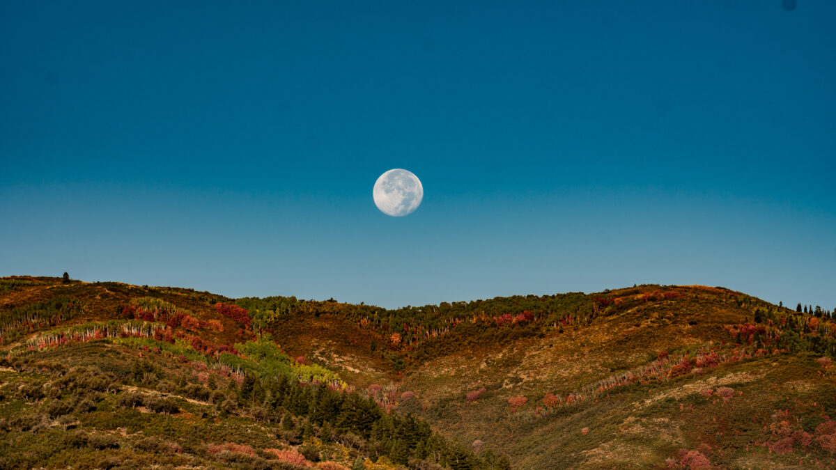 Harvest Moon sets over Park City.