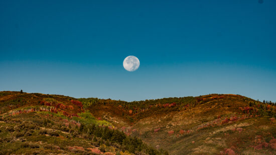 Harvest Moon sets over Park City.