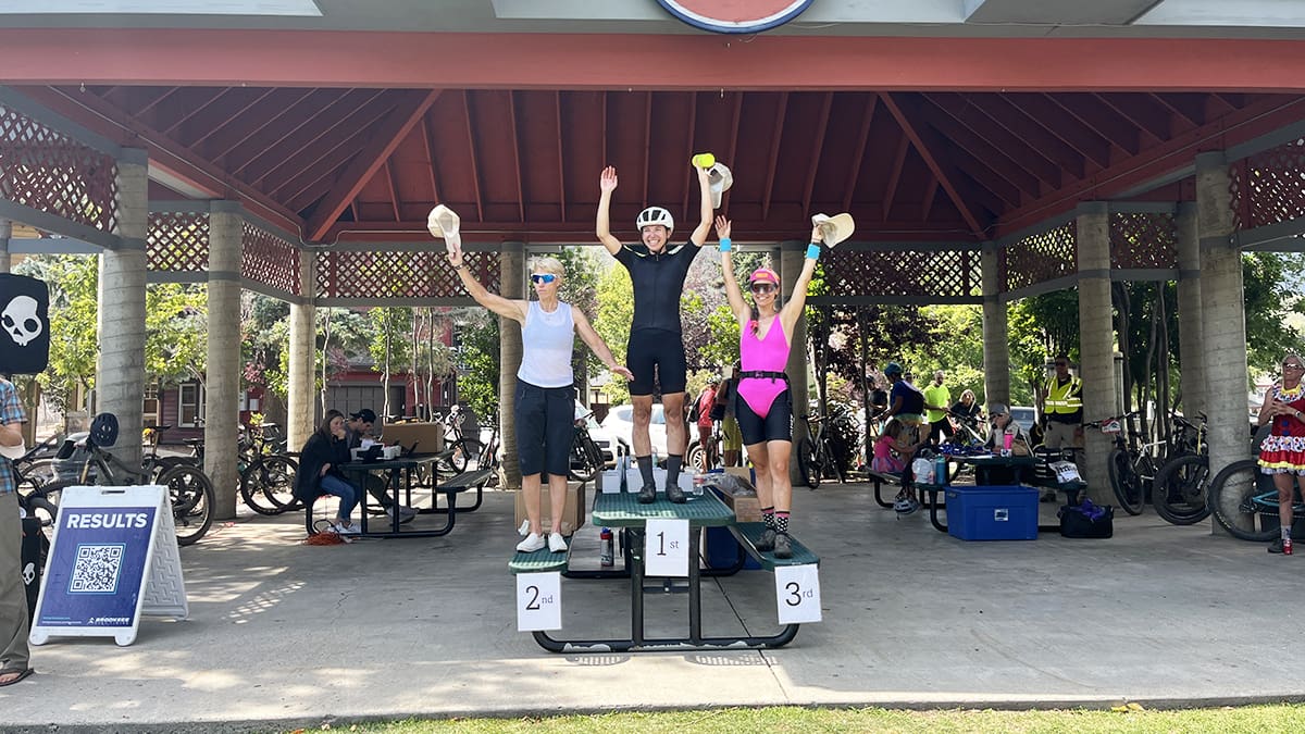 Tour de Suds overall winner Chelsea Bolton stands atop the women's podium on Sunday, September 8, 2024. Bolton finished with a time of 46:17.