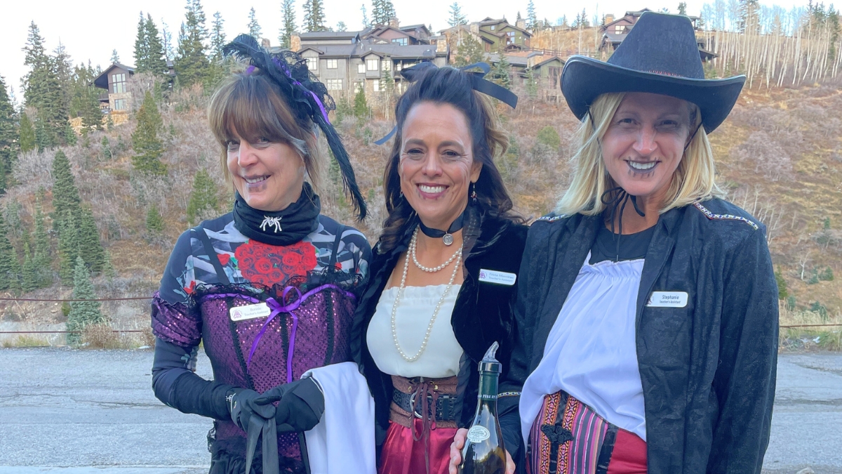 The Nearly-Dead Saloon Girls prepping to pour the wines at the Mines and Wines Tour, 2023.