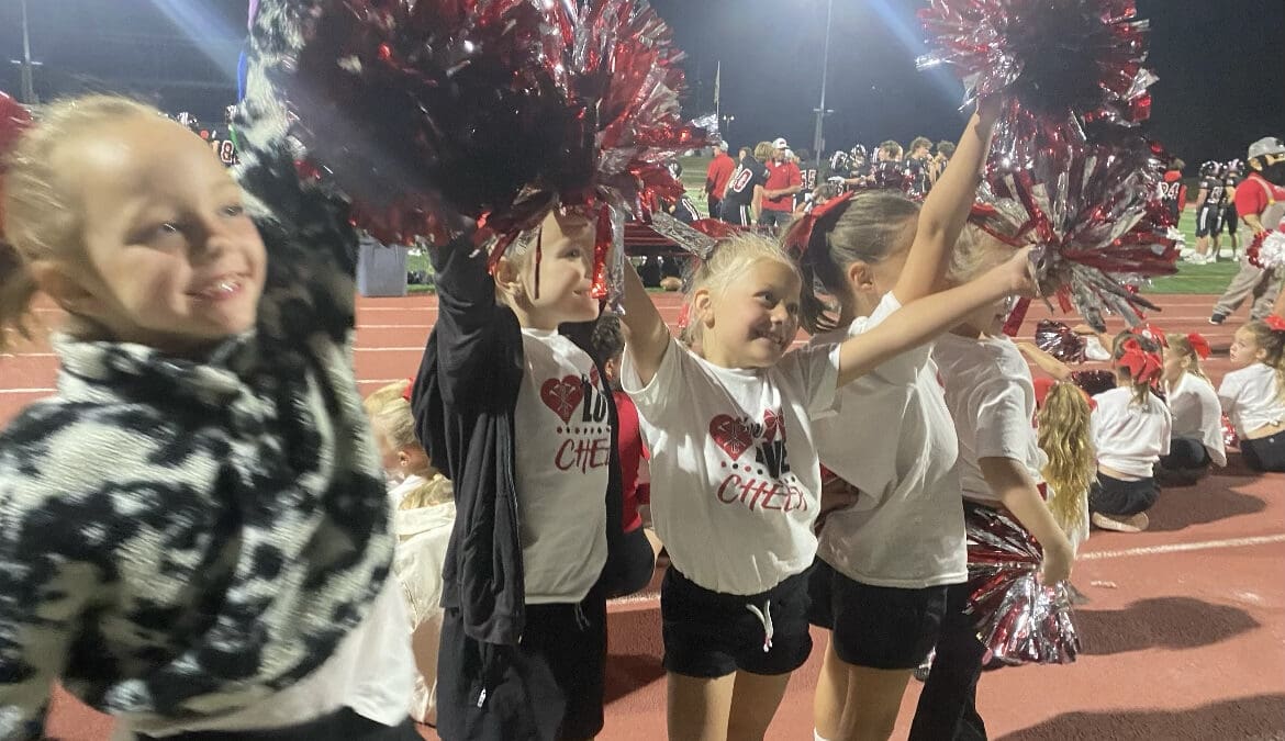 133 mini-cheerleaders took to the field Sept. 27 to perform alongside the PCHS cheer squad.