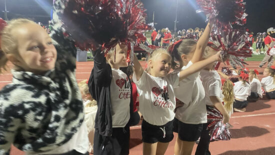 133 mini-cheerleaders took to the field Sept. 27 to perform alongside the PCHS cheer squad.