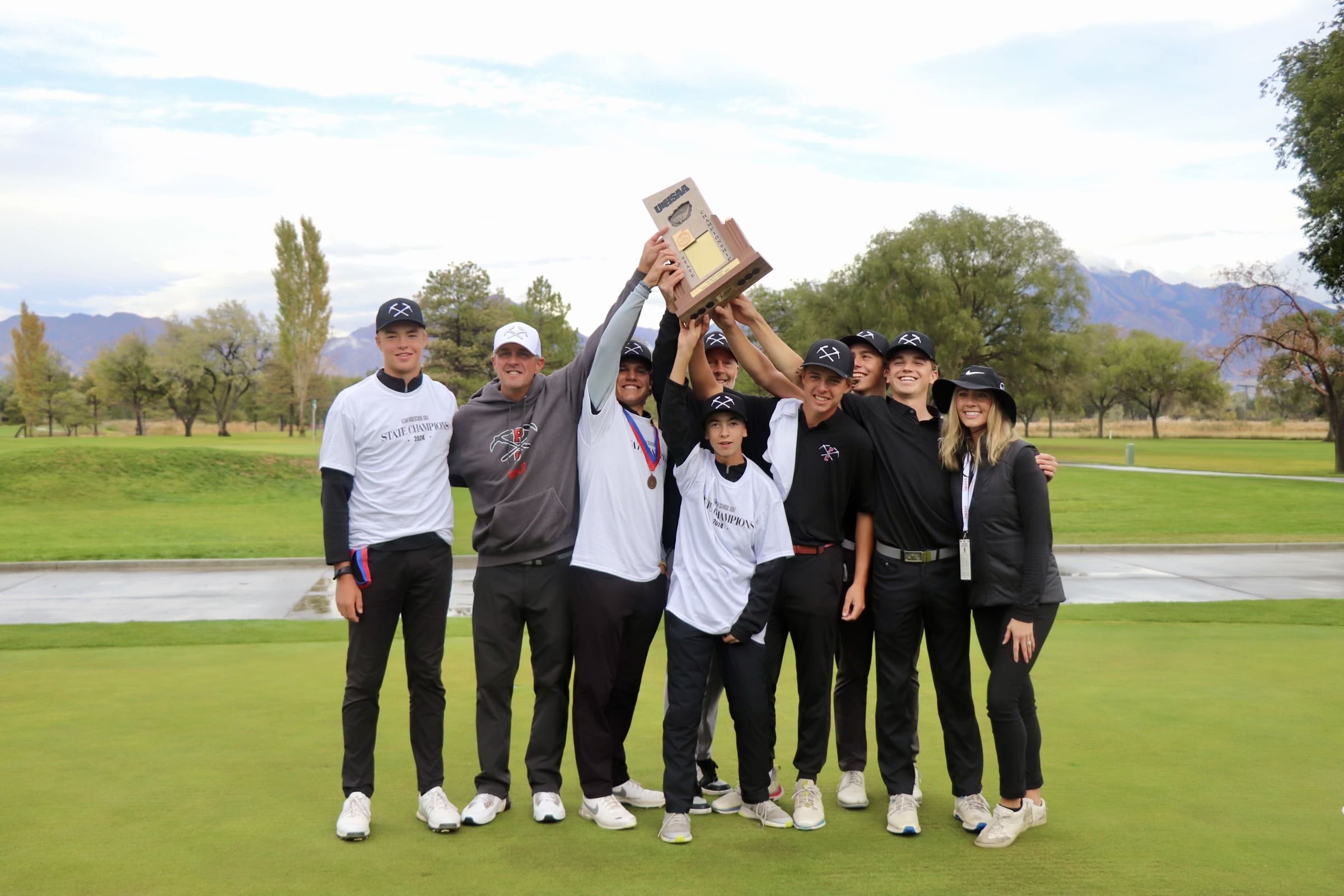 Hoisting the trophy at State.