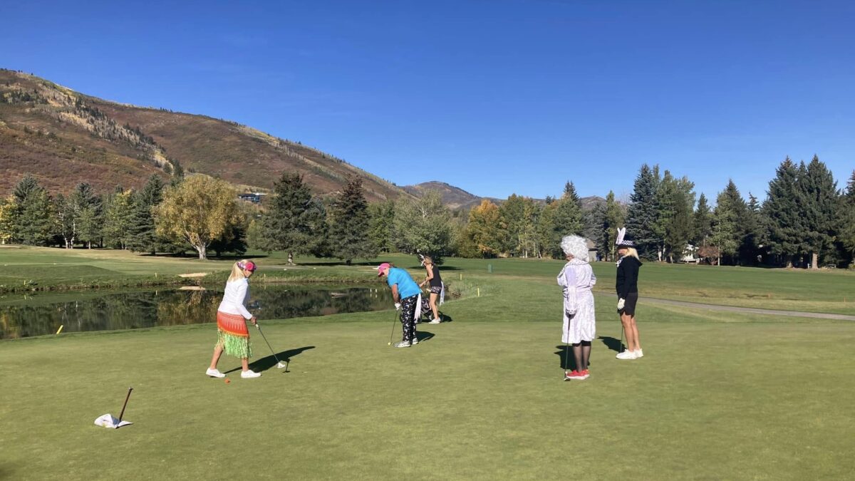 Golf gals not taking the game too seriously.