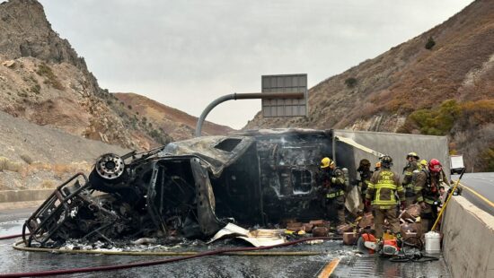 Tractor-trailer that has rolled and caught fire, closing I-80 WB.