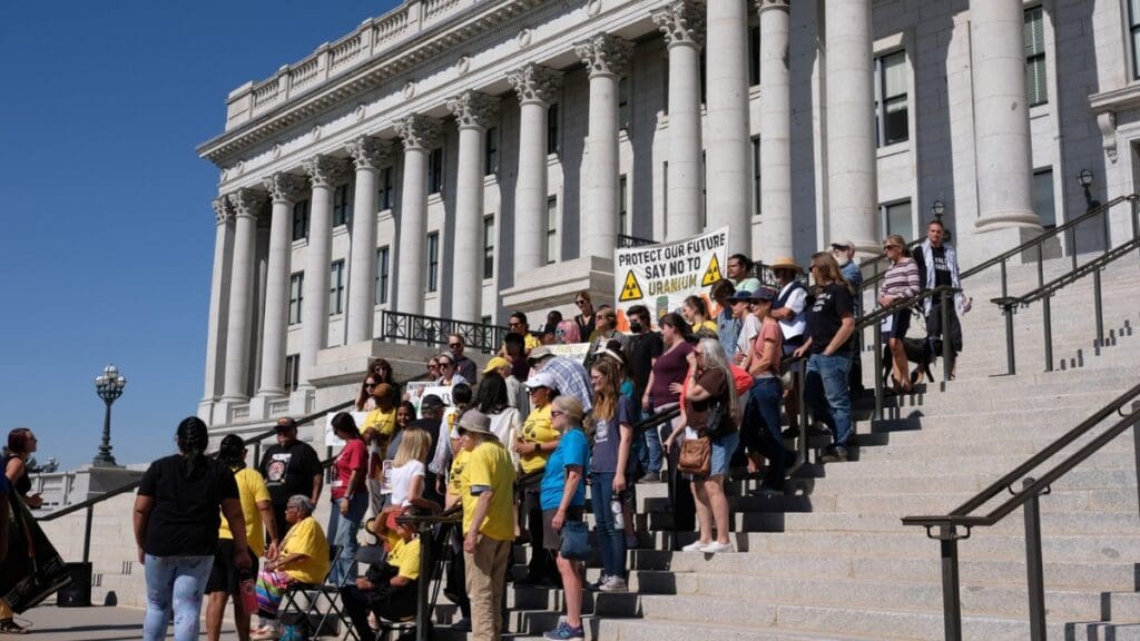 Members of the Ute Mountain Ute Tribe and environmental activists protest the White Mesa Uranium Mill outside the Utah Capitol Building in Salt Lake City on Friday, Oct. 4, 2024.