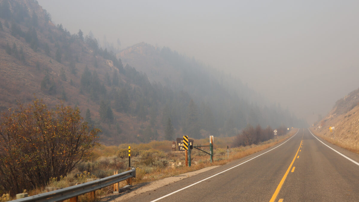 Thick smoke from the Yellow Lake Fire near. the entrance to the Uinta-Wasatch Cache National Forest near Hana, Utah on October 8, 2024.