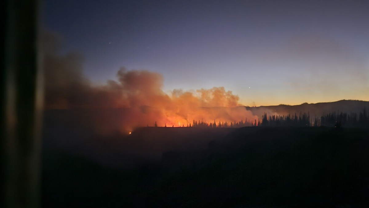 The Yellow Lake Fire burning in the night on Monday, Sept. 30, 2024. The human-caused fire has grown to more than 2,400 acres since it started on Saturday in the Uintas.