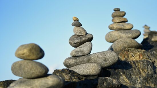 Cairns, which serve as guidance through tough trekking on uncertain path journeys.