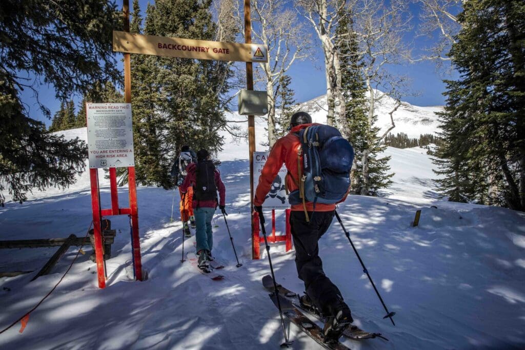 Skiers exit the Eagle Point resort and enter backcountry terrain in the Tushars.