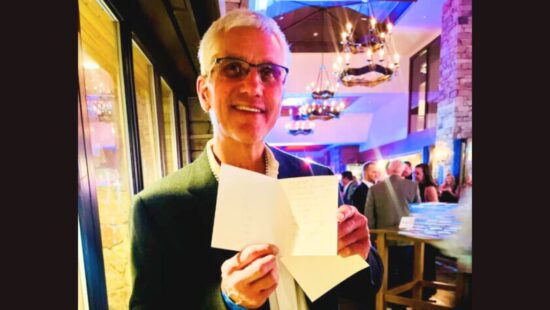 Eric Heiden, winner of an unprecedented five individual Olympic gold medals in long track speedskating. He's the owner and surgeon at Heiden Orthopedics in Park City, Heber City, and Salt Lake City. Pictured here at the 2024 YSA JANS Winter Welcome at the Stein Eriksen Lodge, with a note from Maria Arias.