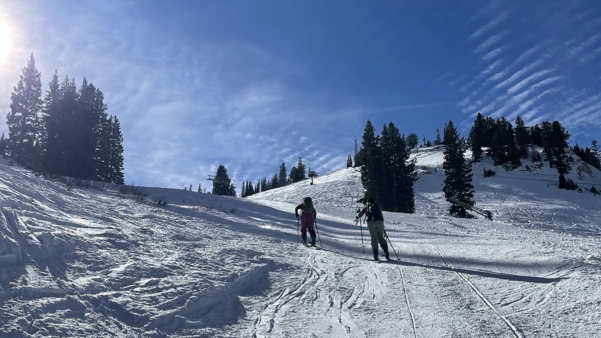 Friends climb up Alta Ski Resort on November 14, 2024.