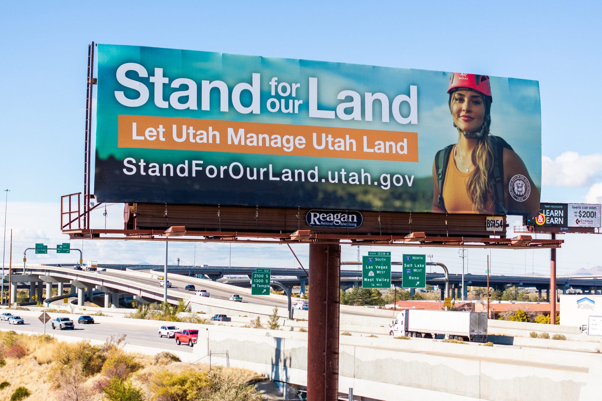 A billboard along I-80 in South Salt Lake promotes Utah’s lawsuit trying to claim control of federally managed land on Monday, Nov. 4, 2024.