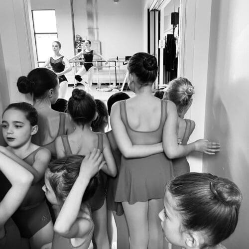 Lower levels watching advanced levels in class at Ballet West Park City.