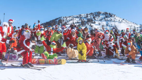 A crowd of Santas at Brighton Resort for the annual Santa Ski Free Day.