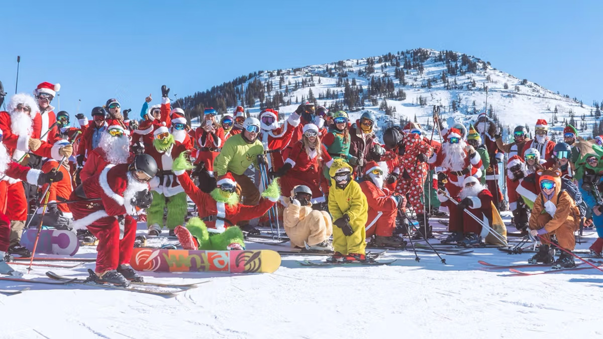 A crowd of Santas at Brighton Resort for the annual Santa Ski Free Day.