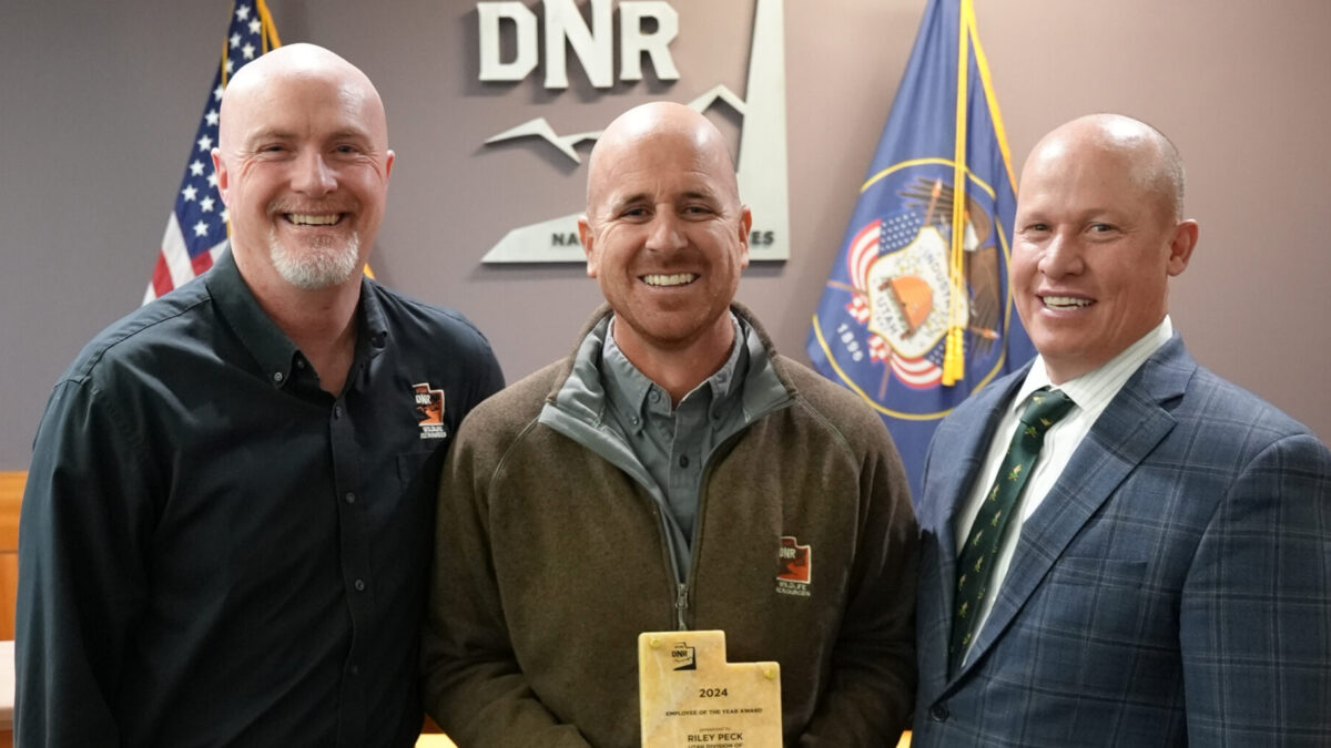 New DWR director was awarded 2024 Employee of the Year award with J. Shirley (left) and Joel Ferry (right).