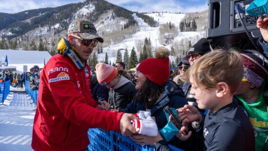 River Radamus signs autographs for fans after the Men’s World Cup Super G at the Stifel Birds of Prey on December 07, 2024 in Beaver Creek, Colorado.