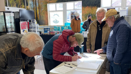 Summit County residents sign the Dakota Pacific referendum at The Market in Park City on January 21, 2025.