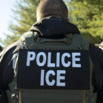 U.S. ICE Baltimore field office director, Matt Elliston, listens during a briefing on Jan. 27, 2025.