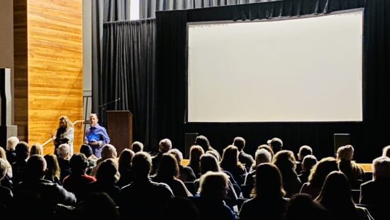 Park City's Joanna Charnes, event organizer and past fellow Temple Har Shalom Board Member, being thanked by Adam Bronfman at a screening of his film "I Have A Name."