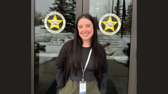 Park City Police Department's Victim Advocate Coordinator Kara Madsen stands in front of the department building, where she works to provide support and resources for victims and survivors of crime.