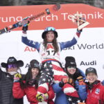 The winner United States' Lauren Macuga celebrates with the team after an alpine ski, women's World Cup super G race, in St. Anton, Austria, Sunday, Jan. 12, 2025.