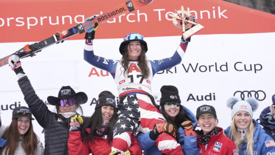 The winner United States' Lauren Macuga celebrates with the team after an alpine ski, women's World Cup super G race, in St. Anton, Austria, Sunday, Jan. 12, 2025.