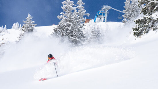 A skier enjoys fresh powder during the opening of Mineral Basin, January 8, 2025.