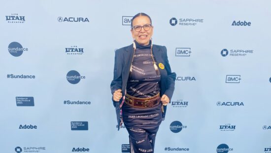 Filmmaker fashion for the Sundance Film Festival documentary Free Leonard Peltier. Her dress is imprinted with phrases inckuding, Free Loenard Peltier, Lakota, and Wrongfully Imprisoned.