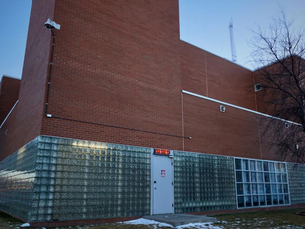 Laramie County Sheriff Brian Kozak has put a blinking vacancy sign, in the style of a roadside motel, over the door to his jail. Kozak is also pursuing an agreement with U.S. Immigrations and Customs Enforcement that would streamline deportation through his jail. (Andrew Graham/WyoFile)