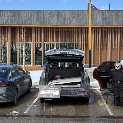 A representative from Wasatch Back Future and a volunteer for Protect Summit County at the Kamas Library parking lot during a signature gathering event held Feb. 15.