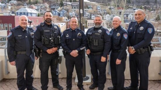 Lieutenant Jay Randall (second from right) of the Park City Police Department proudly marks his retirement after more than 20 years of dedicated service.