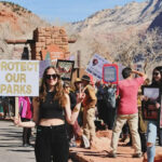 Protesters gathered outside Zion National Park on February 22 to protest the recent firings at the NPS.