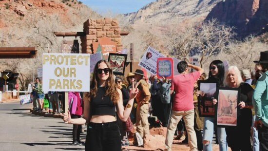 Protesters gathered outside Zion National Park on February 22 to protest the recent firings at the NPS.