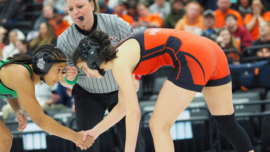 Noa Omessi (Park City) and Ella Reynolds (Provo) shake hands before their match.